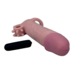 Funda Supreme Extender tipo Magic Flesh con vibración y soporte testicular Glow & Vibe.