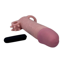 Funda Supreme Extender tipo Magic Flesh con vibración y soporte testicular Glow & Vibe.
