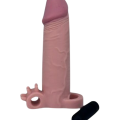Funda Supreme Extender tipo Magic Flesh con vibración y soporte testicular Glow & Vibe.