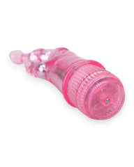 Vibrador Crystal Naughty doble estimulación, curva para punto G y estimulador de clítoris, diseño elegante y atrevido, Glow & Vibe.