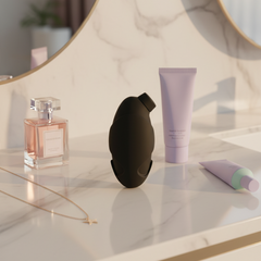 Estimulador Penguin con 7 funciones de succión para clítoris, diseño tierno y elegante Glow & Vibe.