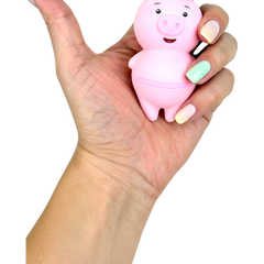 Estimulador Piggie Licks con lengua vibrante de 6 velocidades para clítoris y pezones, diseño rosa coqueto Glow & Vibe.
