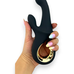 Vibrador Lunar Touch de silicón suave con movimiento lateral y estimulador de clítoris de 10 funciones, diseño elegante Glow & Vibe.