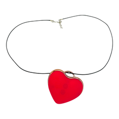 Estimulador Love Shape Necklace con diseño de collar y 10 velocidades de succión y pulsación, joya del placer Glow & Vibe.