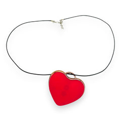 Estimulador Love Shape Necklace con diseño de collar y 10 velocidades de succión y pulsación, joya del placer Glow & Vibe.