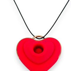 Estimulador Love Shape Necklace con diseño de collar y 10 velocidades de succión y pulsación, joya del placer Glow & Vibe.