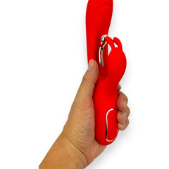 Vibrador Ruby Pulse Glow & Vibe con succionador tipo conejo y estimulador móvil de punto G.