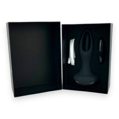 Tappy Plug Glow & Vibe con estimulador móvil de punto G, dilatador anal y control remoto, recargable y de silicón suave.