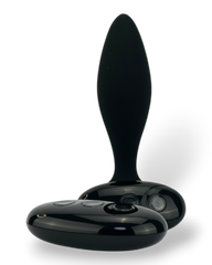 Noir Pulse Glow & Vibe, dilatador anal con control remoto, 10 funciones y carga magnética, hecho de silicón suave y elegante.