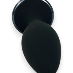 Noir Pulse Glow & Vibe, dilatador anal con control remoto, 10 funciones y carga magnética, hecho de silicón suave y elegante.
