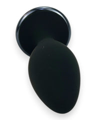 Noir Pulse Glow & Vibe, dilatador anal con control remoto, 10 funciones y carga magnética, hecho de silicón suave y elegante.
