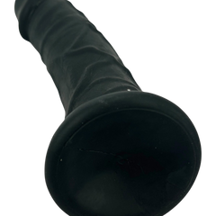 Dark Rider Glow & Vibe, dildo realista de material Magic Flesh con ventosa resistente y textura natural.