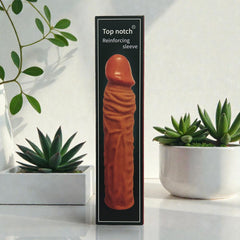 Titan Skin Sleeve Glow & Vibe, funda extensora de pene con textura realista de Magic Flesh y 4 cm de extensión.