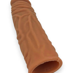 Titan Skin Sleeve Glow & Vibe, funda extensora de pene con textura realista de Magic Flesh y 4 cm de extensión.