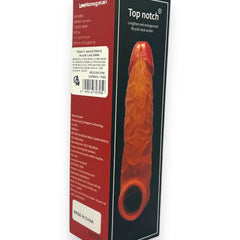 Mega Grip Sleeve Glow & Vibe, funda extensora realista de Magic Flesh con soporte para testículos y textura estimulante.