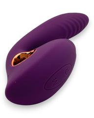 Vibrador Cosmic Alien con 10 funciones de vibración y 10 de succión, diseño futurista Glow & Vibe.