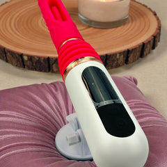 Máquina de placer Pink Machine con movimiento telescópico y rotación envolvente Glow & Vibe.