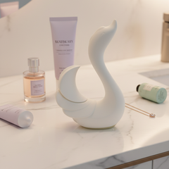 Vibrador Magic Swan con succionador clitorial, diseño elegante inspirado en cisne, Glow & Vibe.