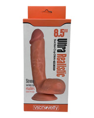Dildo ultra realista Real King Magic Flesh con ventosa y testículos, textura suave y detallada, marca Glow & Vibe.