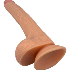 Dildo ultra realista Real King Magic Flesh con ventosa y testículos, textura suave y detallada, marca Glow & Vibe.