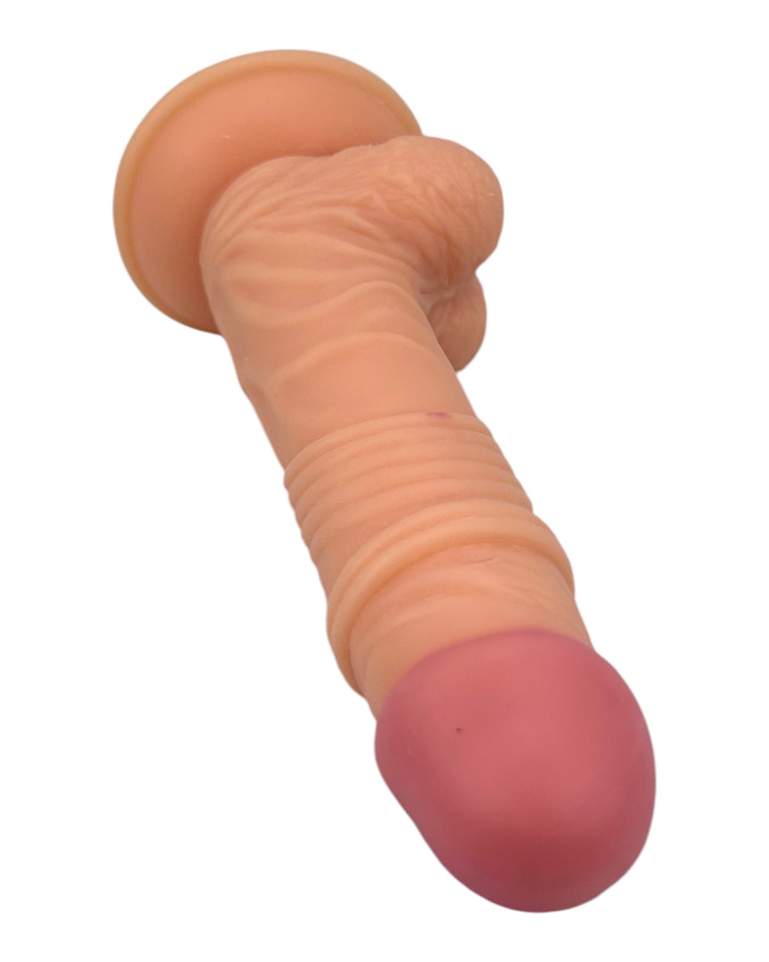 Dildo realista Marcus con testículos y ventosa, color piel, material suave y firme de Glow & Vibe.