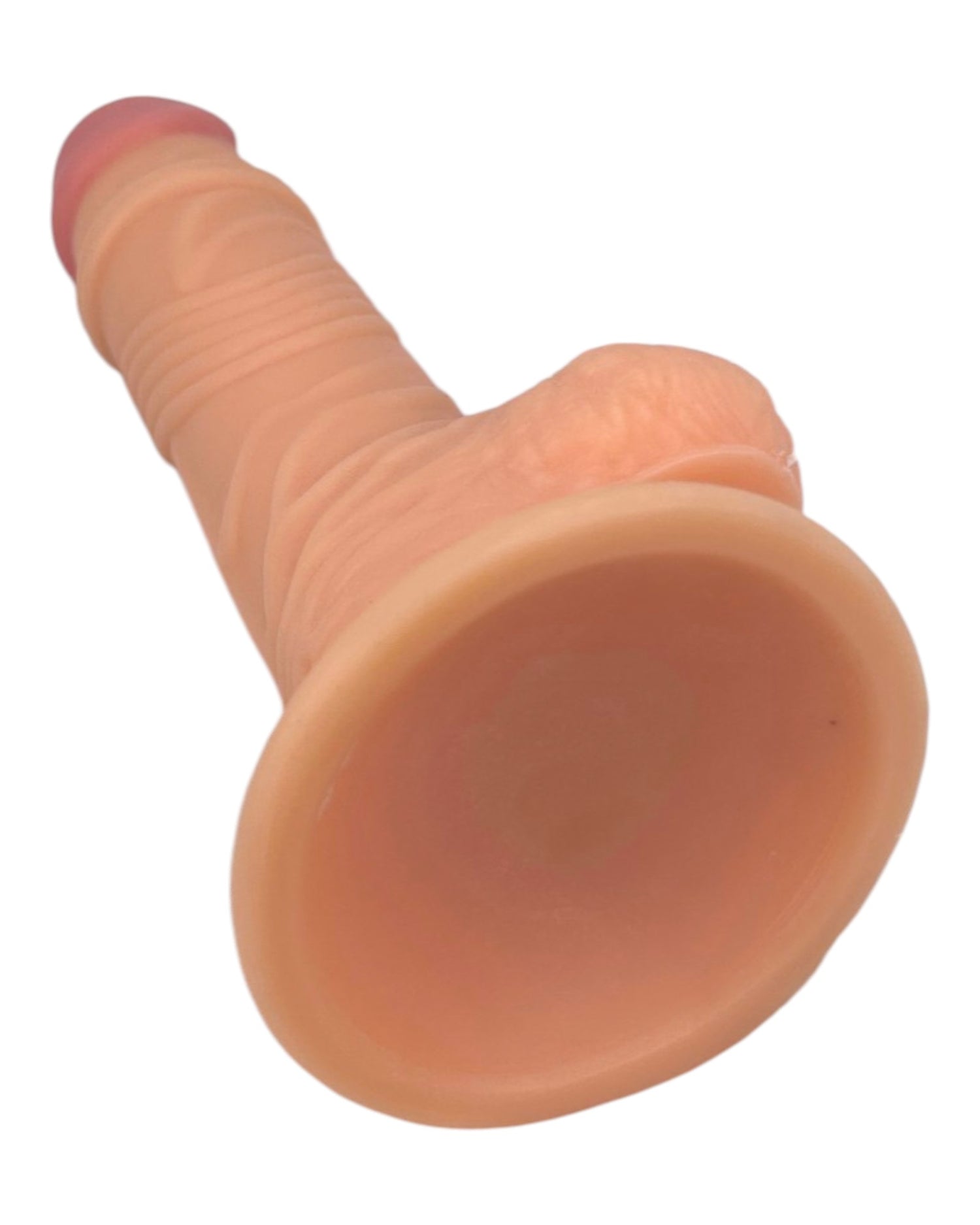Dildo realista Marcus con testículos y ventosa, color piel, material suave y firme de Glow & Vibe.