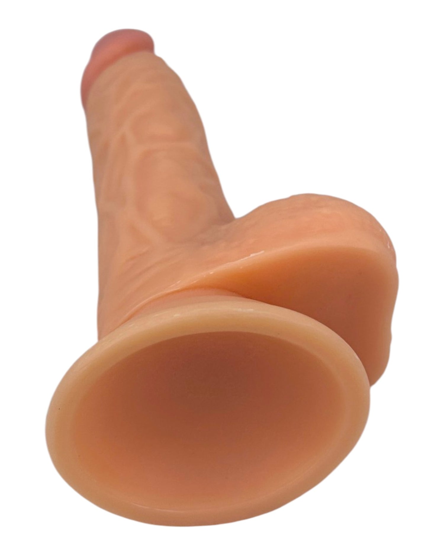 Dildo realista Mr. Rude Magic Flesh con ventosa y testículos, acabado ultra real y flexible, marca Glow & Vibe.