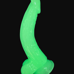 Dildo fluorescente Glow Rider con ventosa y forma curva, brilla en la oscuridad, marca Glow & Vibe.