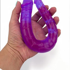 Dildo doble realista Double Ecstasy Magic Flesh con doble cabeza, textura suave, marca Glow & Vibe.