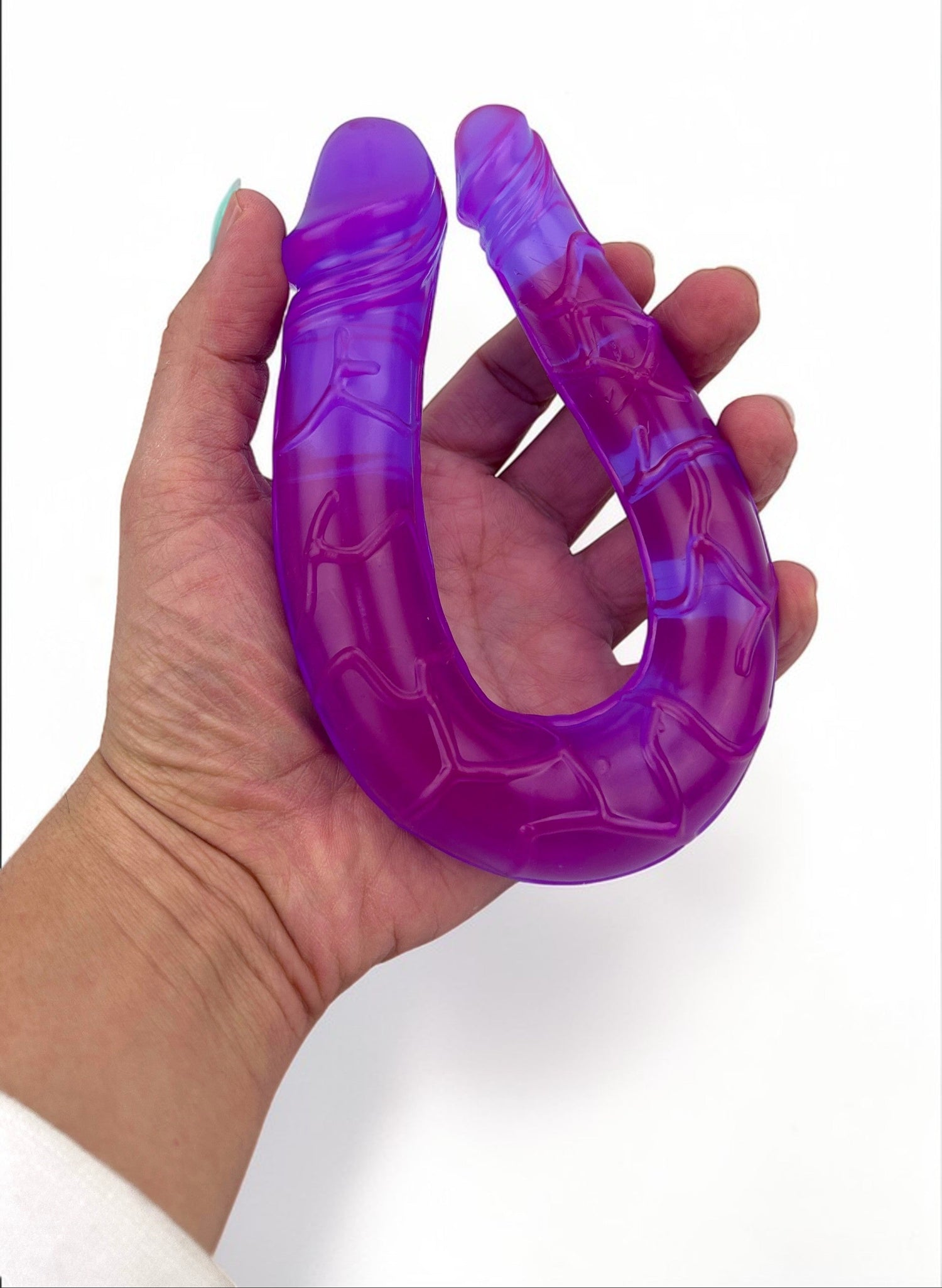 Dildo doble realista Double Ecstasy Magic Flesh con doble cabeza, textura suave, marca Glow & Vibe.