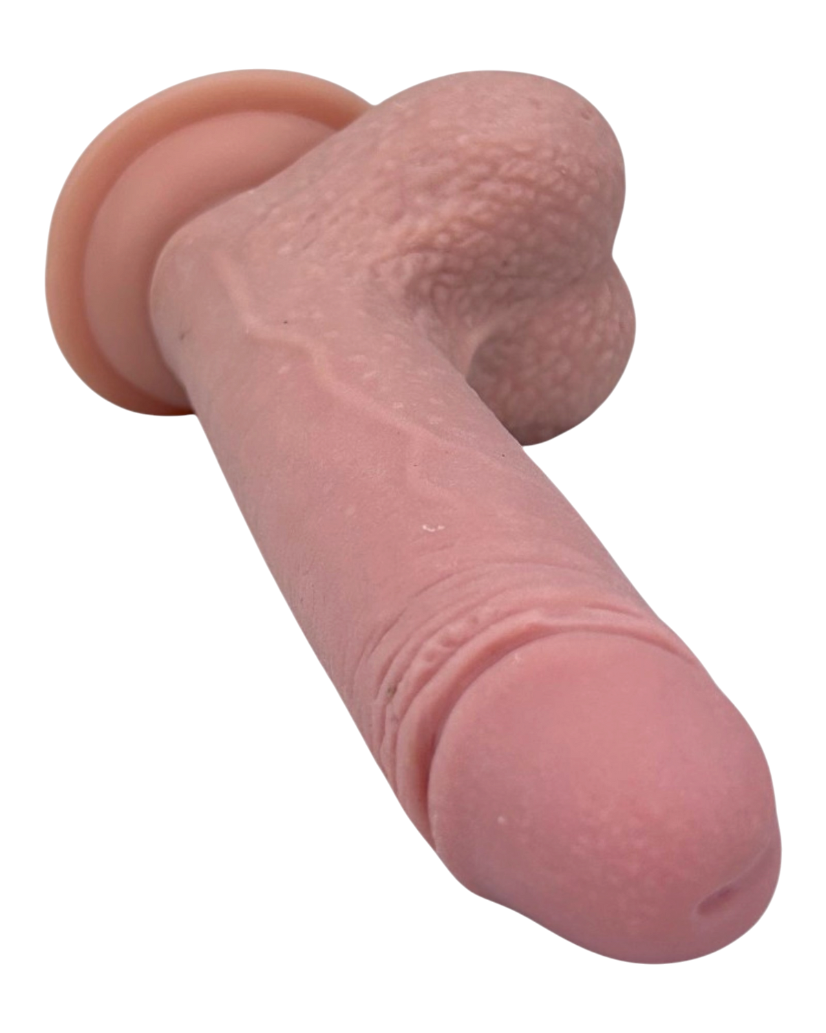 Dildo realista Real Slide con ventosa, textura de piel deslizante y flexible, marca Glow & Vibe.
