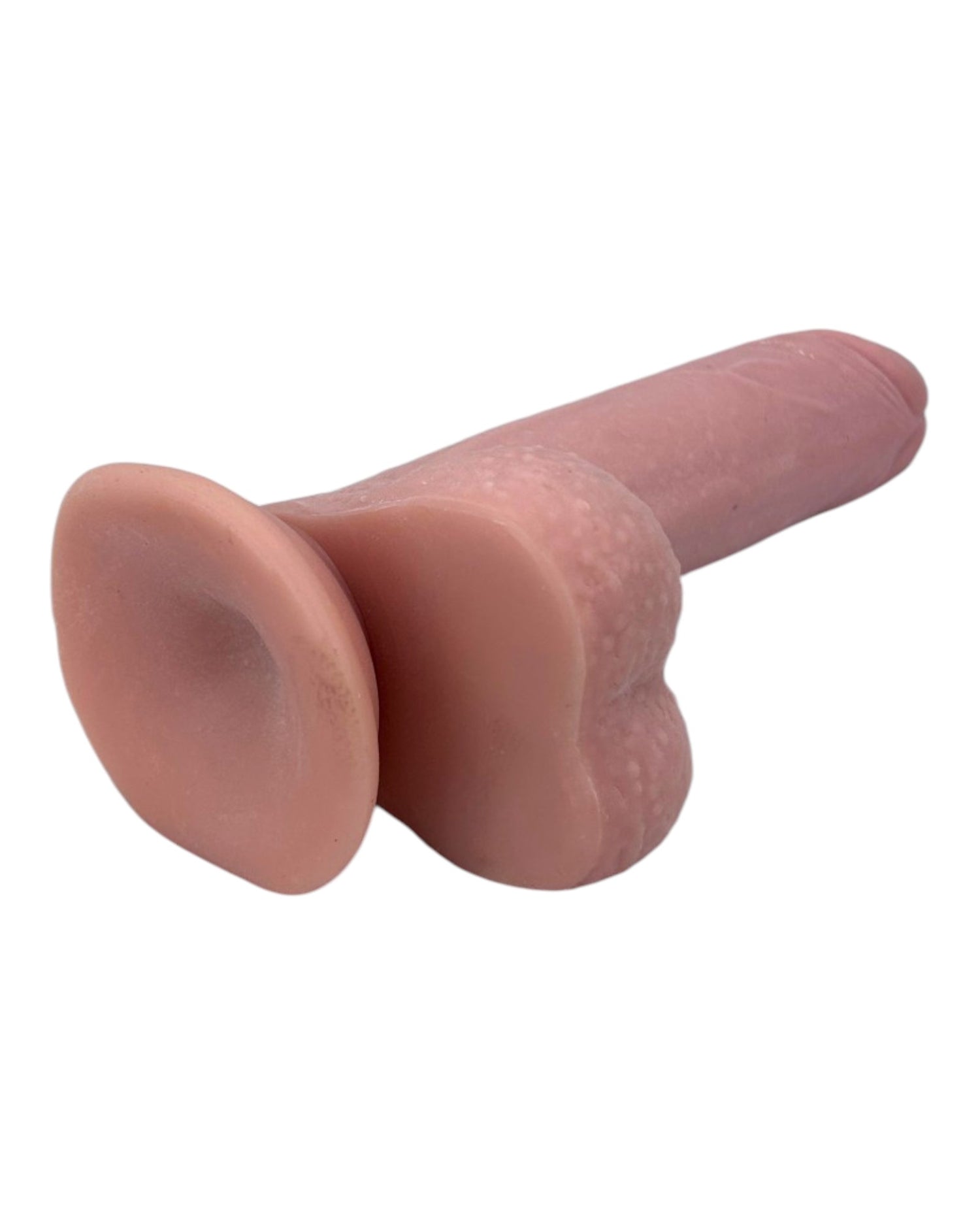 Dildo realista Real Slide con ventosa, textura de piel deslizante y flexible, marca Glow & Vibe.