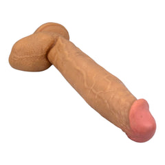 Dildo extra grande King Size Magic Flesh con testículos y ventosa, textura ultra realista, marca Glow & Vibe.