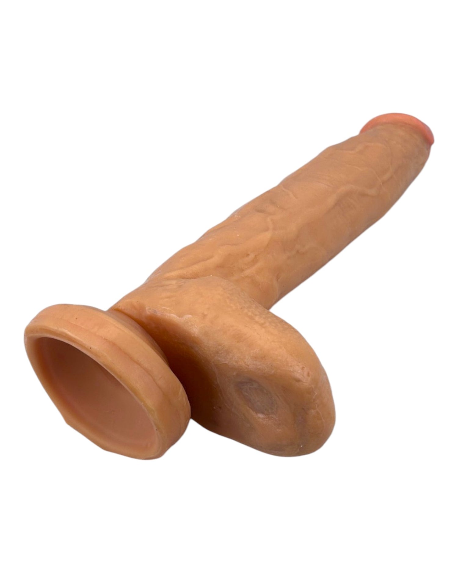 Dildo extra grande King Size Magic Flesh con testículos y ventosa, textura ultra realista, marca Glow & Vibe.