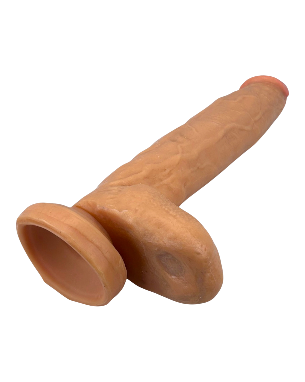 Dildo extra grande King Size Magic Flesh con testículos y ventosa, textura ultra realista, marca Glow & Vibe.