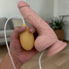 Dildo realista Real Shot con testículos, ventosa y función de eyaculación, marca Glow & Vibe.