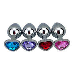 Butt plug metálico Gema Heart con brillante gema en forma de corazón, diseño elegante y coqueto de Glow & Vibe.