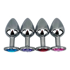 Butt plug metálico Gema Heart con brillante gema en forma de corazón, diseño elegante y coqueto de Glow & Vibe.