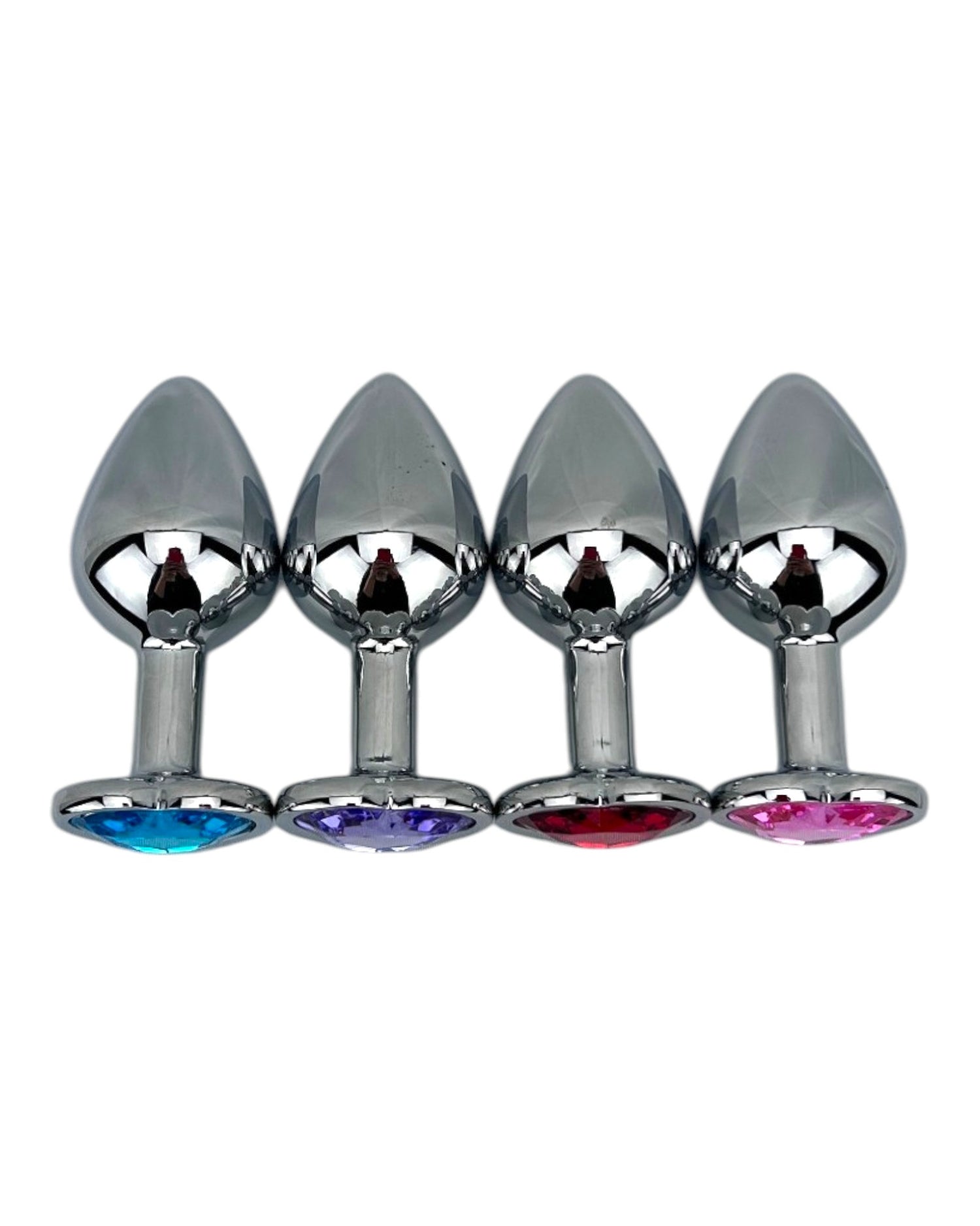 Butt plug metálico Gema Heart con brillante gema en forma de corazón, diseño elegante y coqueto de Glow & Vibe.