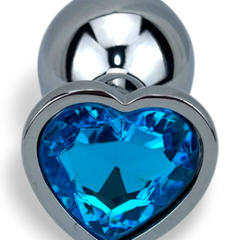 Butt plug metálico Gema Heart con brillante gema en forma de corazón, diseño elegante y coqueto de Glow & Vibe.