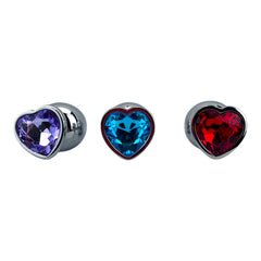 Butt plug metálico Gema Heart con brillante gema en forma de corazón, diseño elegante y coqueto de Glow & Vibe.