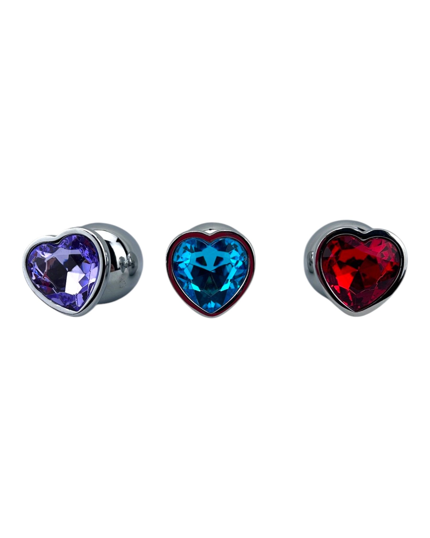 Butt plug metálico Gema Heart con brillante gema en forma de corazón, diseño elegante y coqueto de Glow & Vibe.