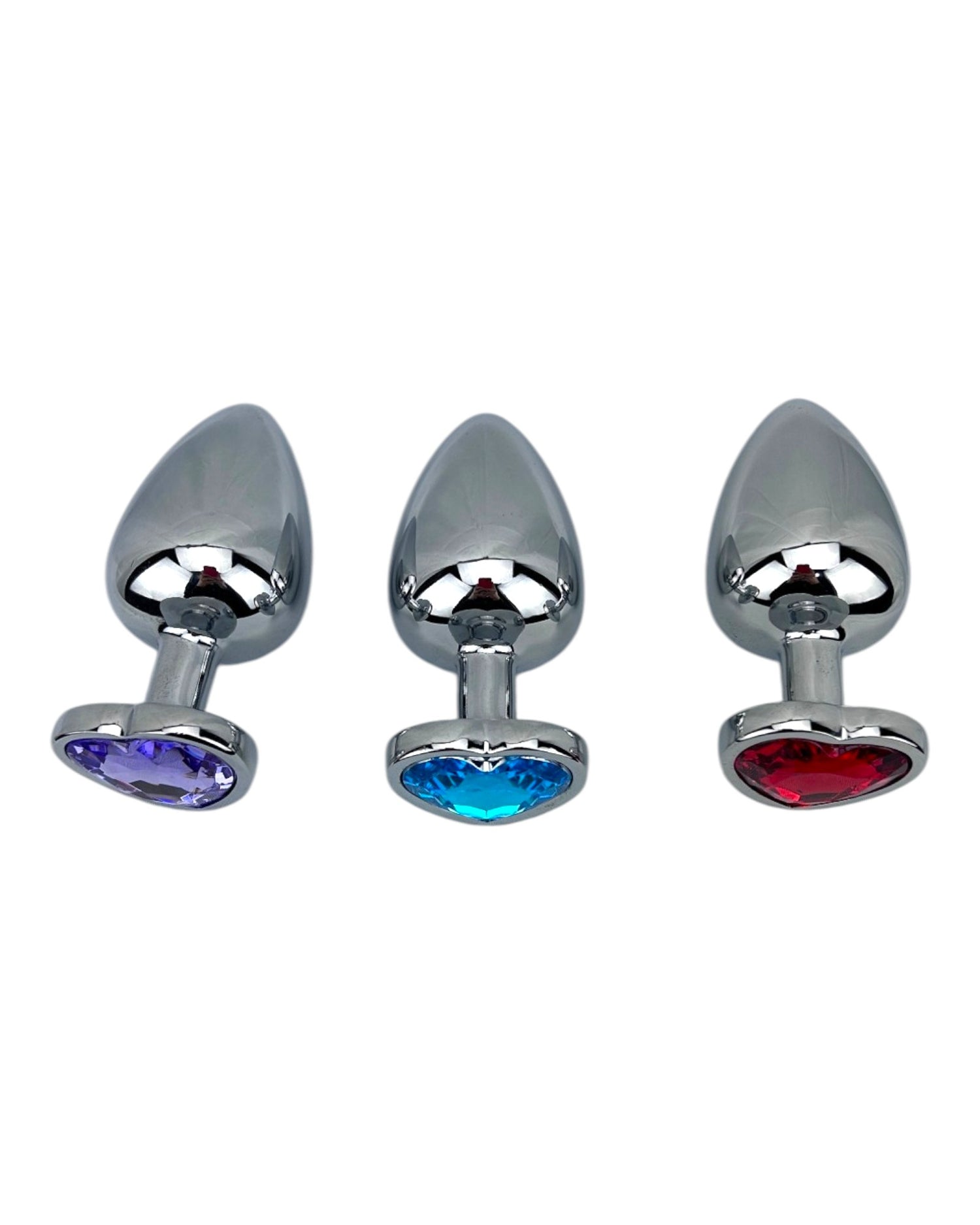 Butt plug metálico Gema Heart con brillante gema en forma de corazón, diseño elegante y coqueto de Glow & Vibe.