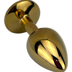 Plug anal metálico Gema Golden en acabado dorado, diseño elegante y lujoso de Glow & Vibe.