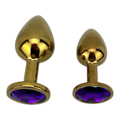 Plug anal metálico Gema Golden en acabado dorado, diseño elegante y lujoso de Glow & Vibe.
