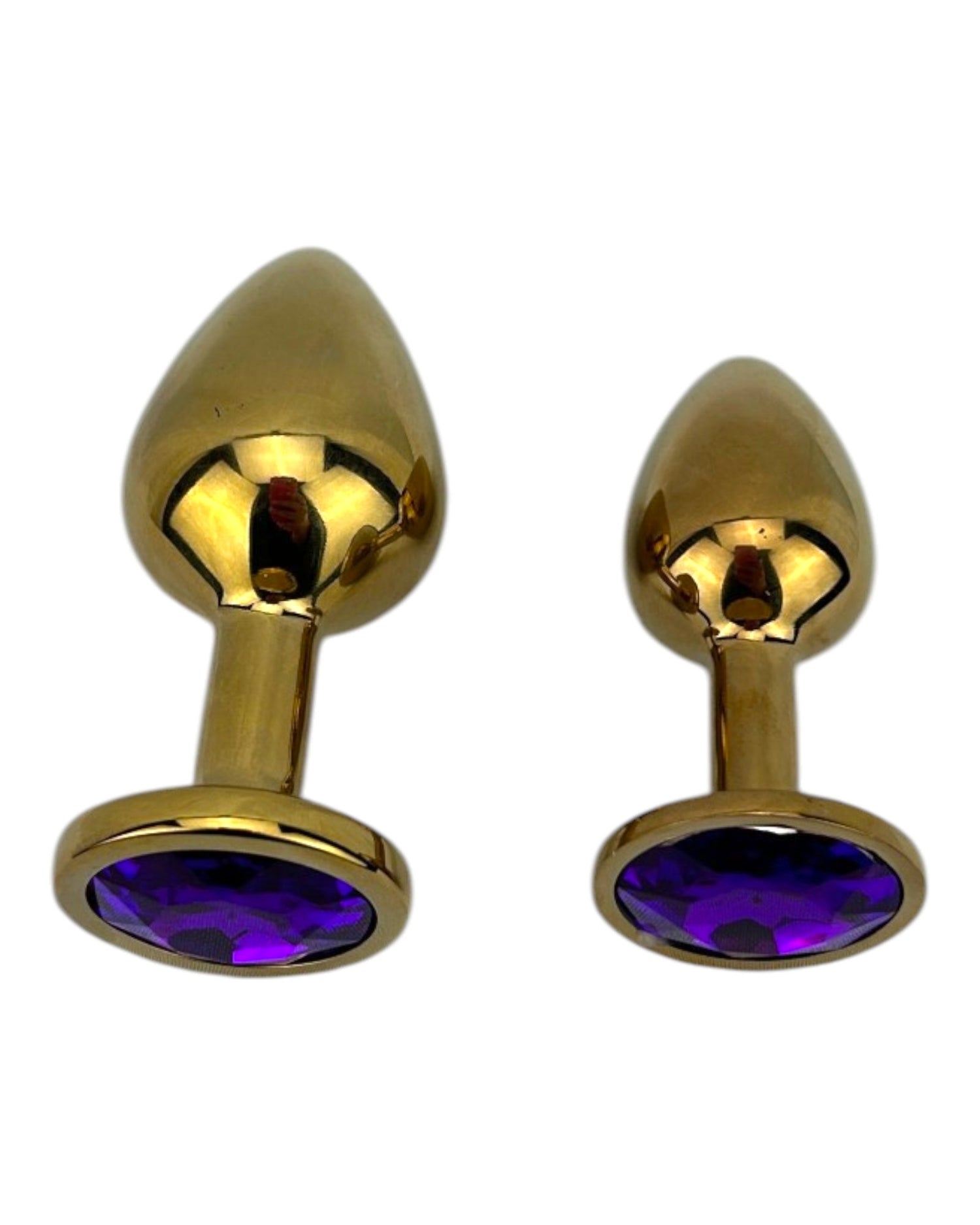 Plug anal metálico Gema Golden en acabado dorado, diseño elegante y lujoso de Glow & Vibe.