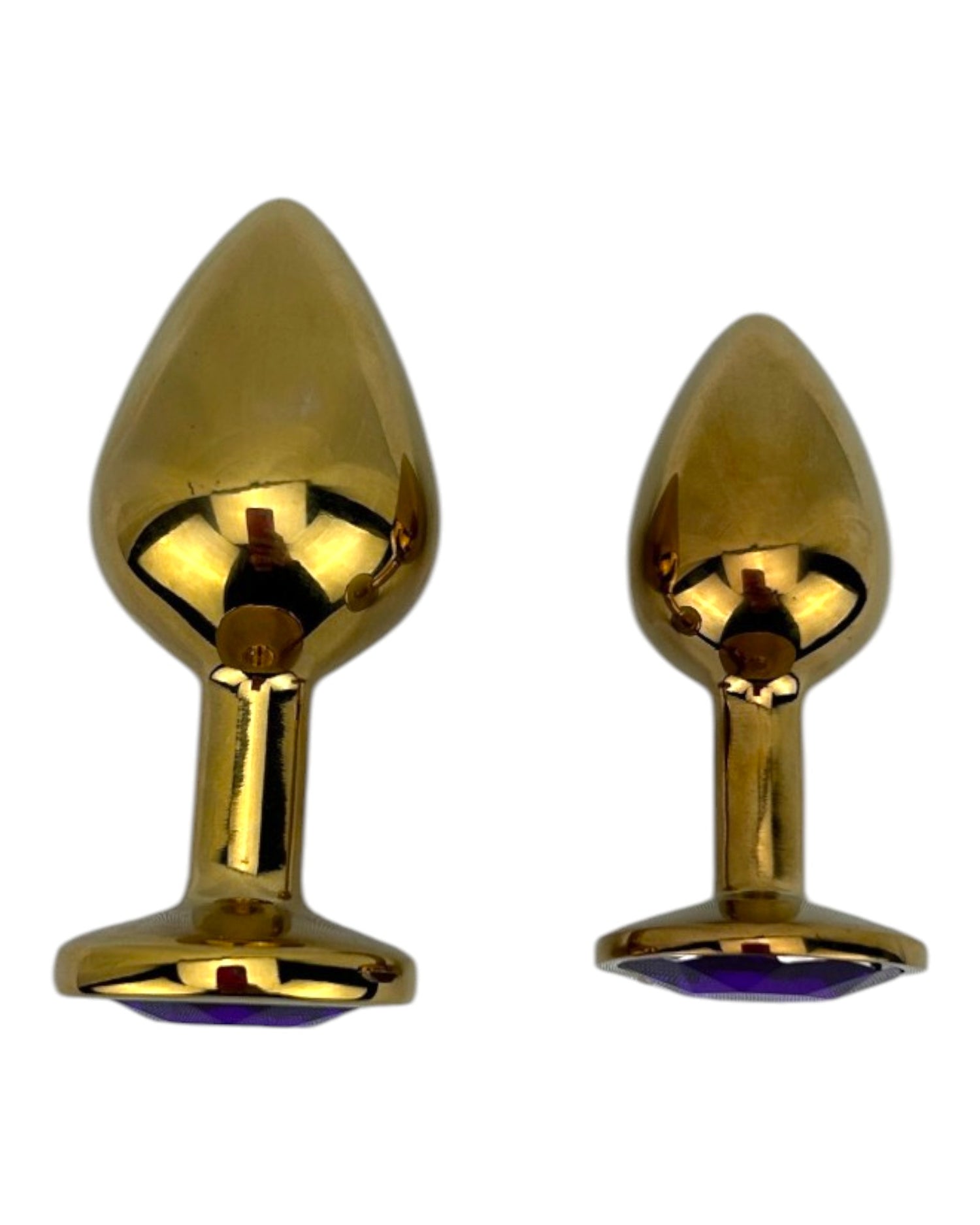 Plug anal metálico Gema Golden en acabado dorado, diseño elegante y lujoso de Glow & Vibe.