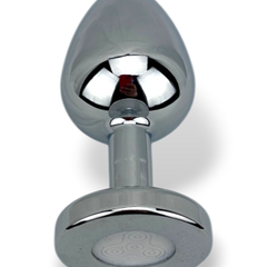 Plug metálico Gema Glow con luz y gema brillante, diseño luminoso y glamuroso de Glow & Vibe.