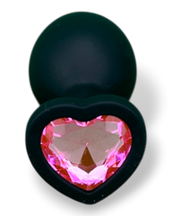 Plug anal Gema Dark de silicón negro con gema redonda brillante, diseño elegante y misterioso de Glow & Vibe.