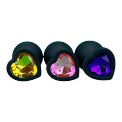 Plug anal Gema Dark de silicón negro con gema redonda brillante, diseño elegante y misterioso de Glow & Vibe.